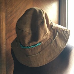 Brown hat with turquoise bead detail